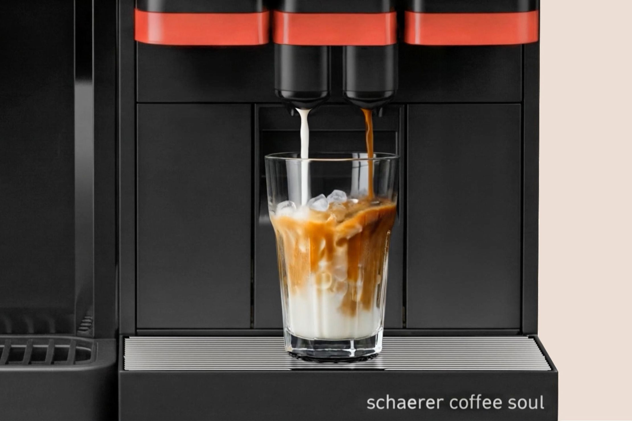 Schaerer Coffee Soul dispensing coffee into a glass with ice cubes