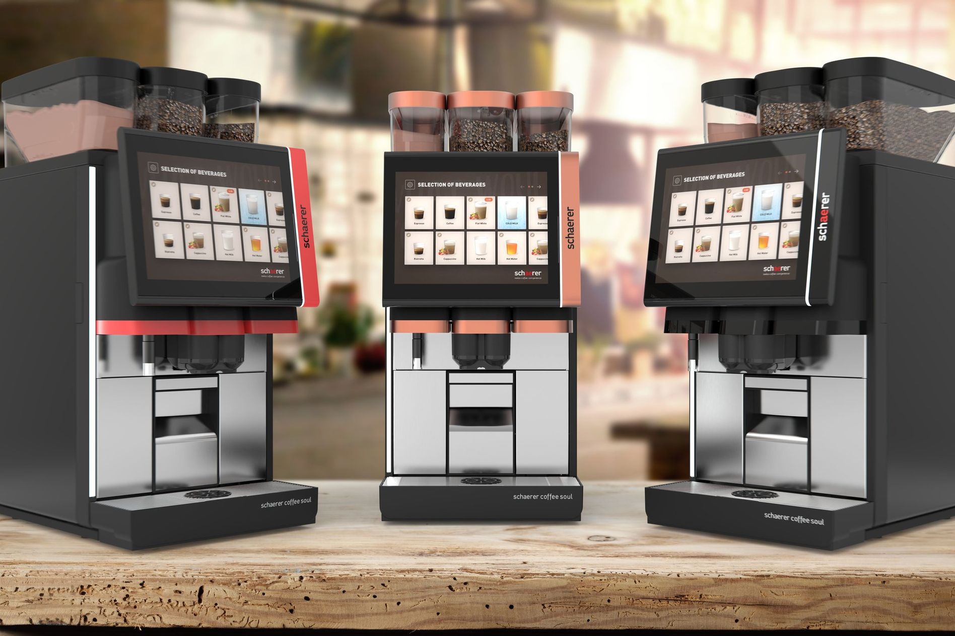 Three modern coffee machines with digital touchscreens displaying beverage options, placed on a wooden counter in a blurred cafe setting.
