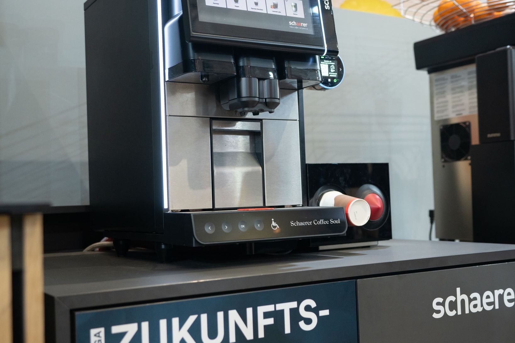 Schaerer Coffee Soul machine with touch screen on display, nominated for Internorga Zukunftspreis, in a modern setting.
