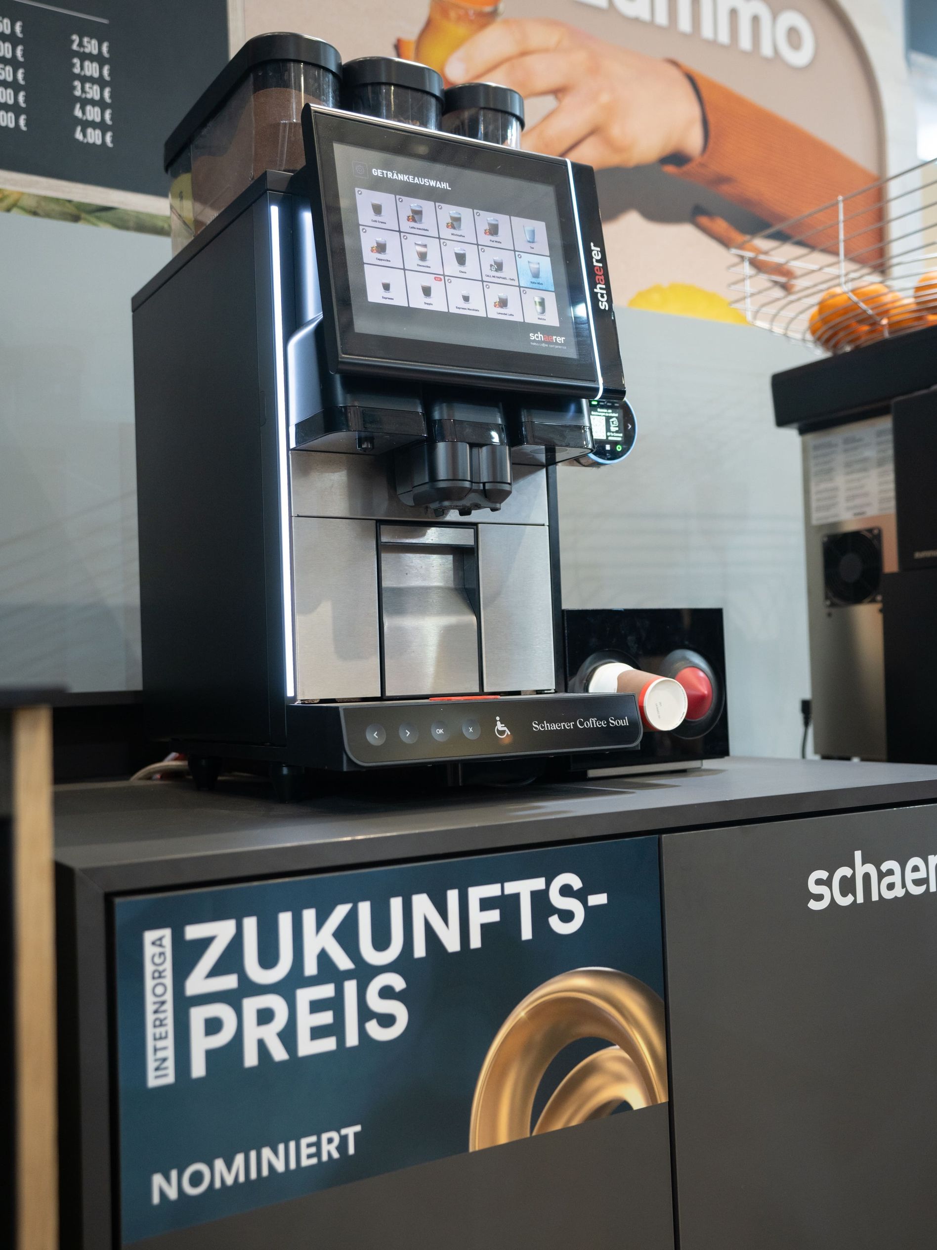 Schaerer Coffee Soul machine with touch screen on display, nominated for Internorga Zukunftspreis, in a modern setting.